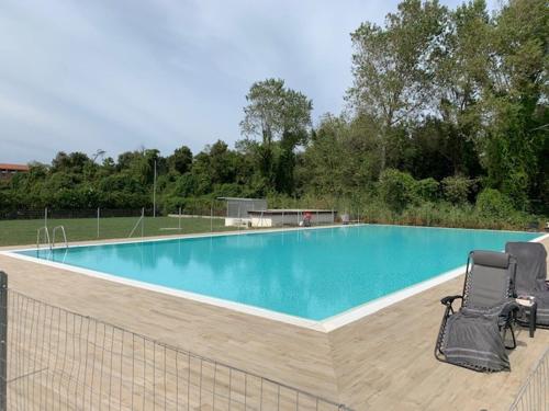 Úszómedence, GuestHost -Seaside Studio with Swimming Pool and Parking in Tirrenia