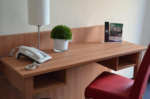 Ambassador Apparthotel - Hotel - Grasbrunn