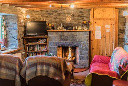 Koplietošanas atpūtas telpa ar TV, Angelas Farmhouse Lauragh by Trident Holiday Homes in Lauragh
