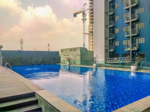 Good Deal Studio at Evenciio Apartment Margonda near UI By Travelio - image 3