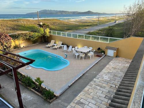 Ampla casa completa, pé na areia Praia do Foguete, Cabo Frio – khách sạn tại Foguete