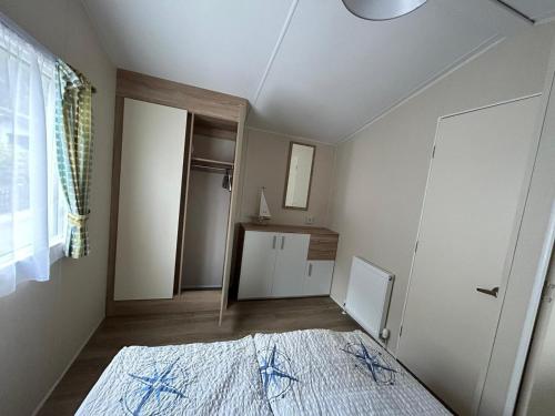 Chalet Kegelrobbe mir riesiger überdachter Terrasse am Kransburger See 544