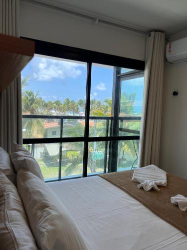 Vista privilegiada de coqueiral e mar, Rooftop, Piscina e Pé na Areia em Maraca – khách sạn tại Maracaipe