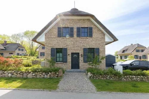 Reetdachhaus Meeresleuchten in Hohenkirchen, Deutschland