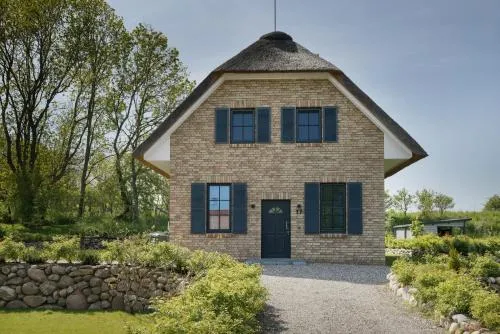 Reetdachhaus Strandperle in Hohenkirchen, Deutschland