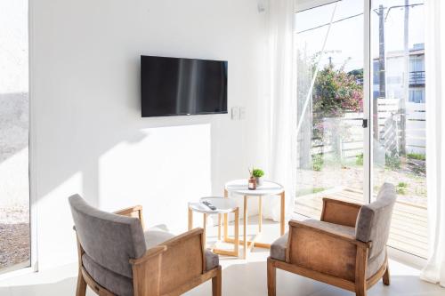 Casas Blancas Balneario Buenos Aires con parrilla cerca del mar in Balneario Buenos Aires