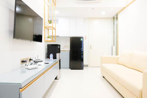 Exclusive and Spacious 2BR Apartment at Supermall Mansion Surabaya By Travelio