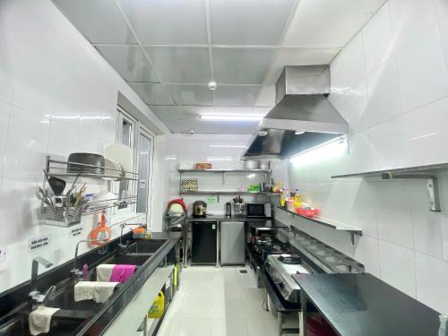 Küche, HOTEL LA PERLE in Hue