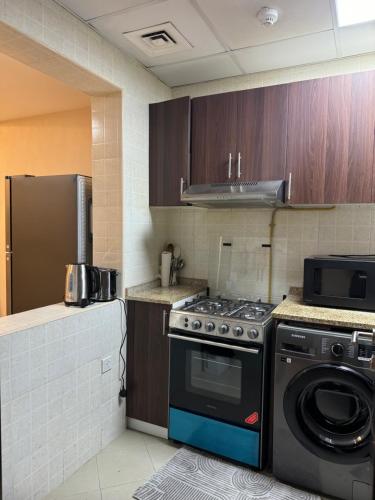 Cozy 1Bed Sports city, Dubaj (fotografie 6)