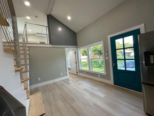 Bed in Modern Shared Luxury Tiny Home