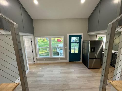 Bed in Modern Shared Luxury Tiny Home