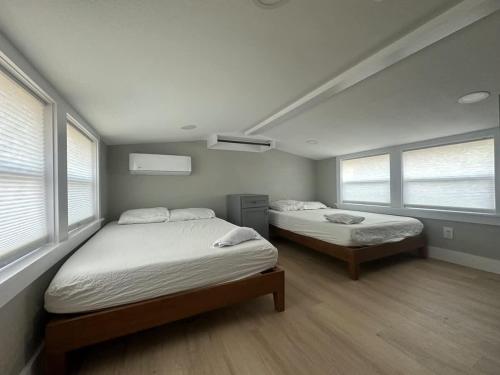 Bed in Modern Shared Luxury Tiny Home