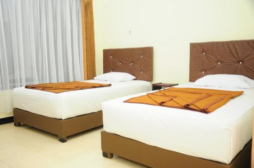 Dena Hotel in Taubneno