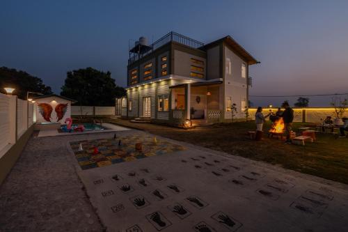 Exterior view of SaffronStays Sher Bagh - 4BR eco-friendly pool villa with jungle trails, farm-to-table meals & bonfi