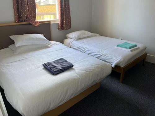 5 Bedroom House A with 13 Beds including 6 Double Beds, 2 Single Beds, and 5 Sofa Beds