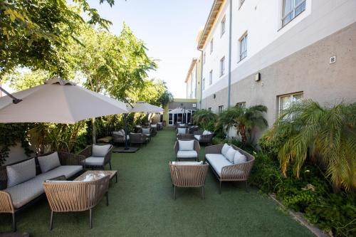 餐廳, 旅屋酒店 (TraveLodge Hotel) in 嘉博羅內