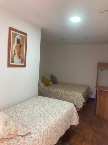2 double beds, 1 twin bed