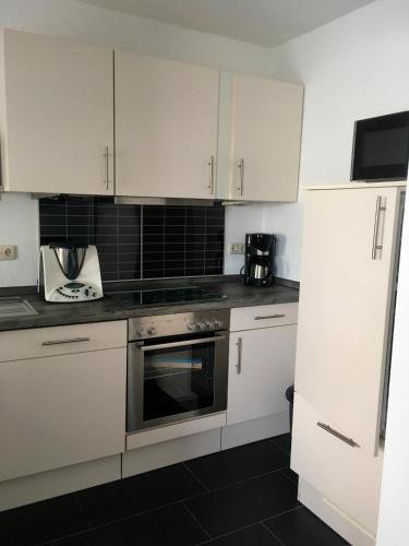 Kapitäns Koje mit Strandkorb (Kapitans Koje mit Strandkorb) in 埃肯弗德