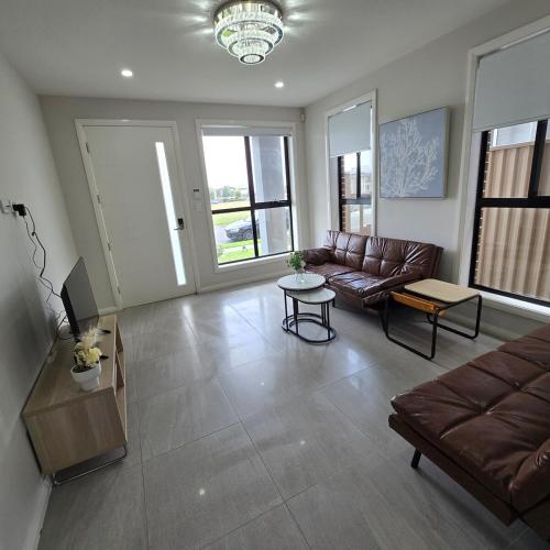 Center of Rouse Hill house with back yd