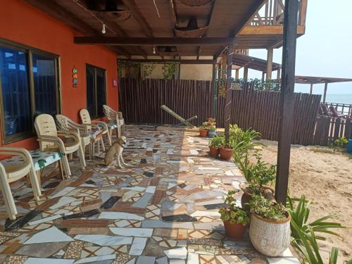 Balkons/terase, Adinam's Beach Retreat in Nyanyanu