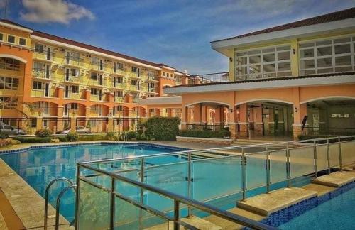Swimming pool, Extra TV@Bedroomw/Netflix & Disney+ | Grind&Unwind near Benjarong Bar and Restaurant Davao