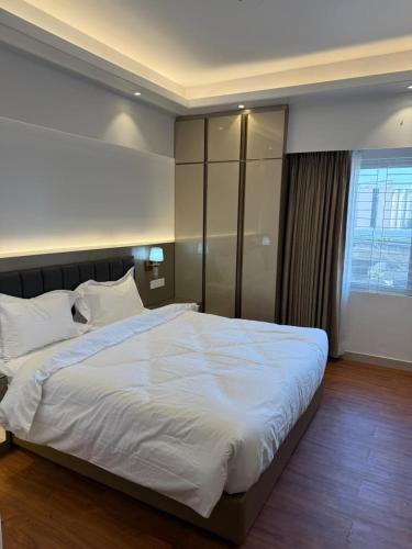 Exterior view of I-suites Residence & Restaurant