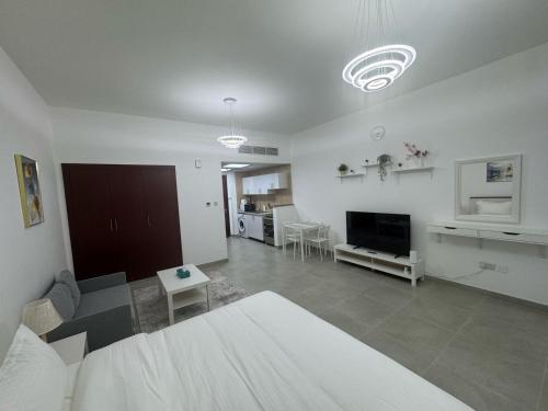 England Cluster International City - Bright,Spacious and Well Furnished Studio, Dubaj (zdjęcie 2)