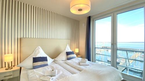 Apartmenthaus Hafenspitze Ap 25, Pier 25, Blickrichtung offene SeeStrand - a72363, Eckernförde (Foto 8)