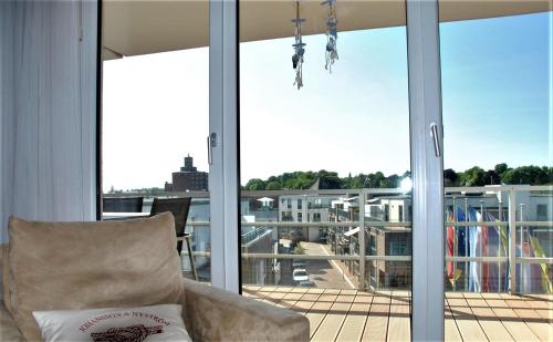 Apartment 29 "Heimathafen 29", Apartmenthaus Hafenspitze, Blickrichtung InnenstadtBinnenhafen in Eckernforde