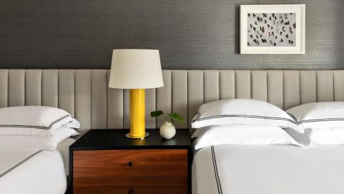 Premium Queen Room with Two Queen Beds and Balcony image 3