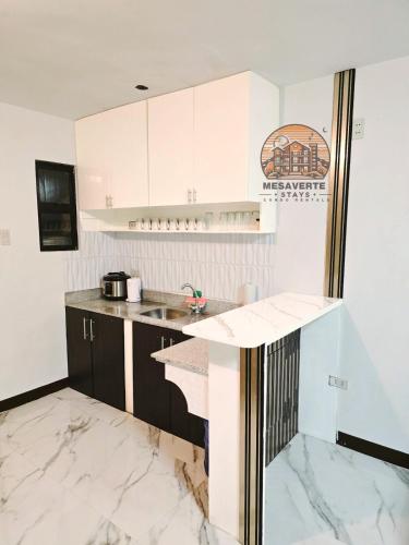 Kitchen, Staycation 2BR Townhouse in Montierra Uptown CDO near Macahambus Hill Cave
