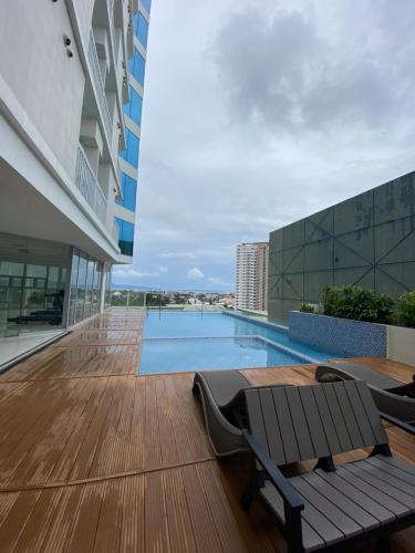 Cozy Condo Unit Beside Abreeza Mall With Parking - Davao City