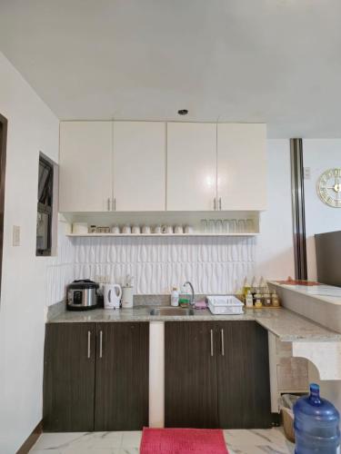 Kitchen, Staycation 2BR Townhouse in Montierra Uptown CDO near Macahambus Hill Cave