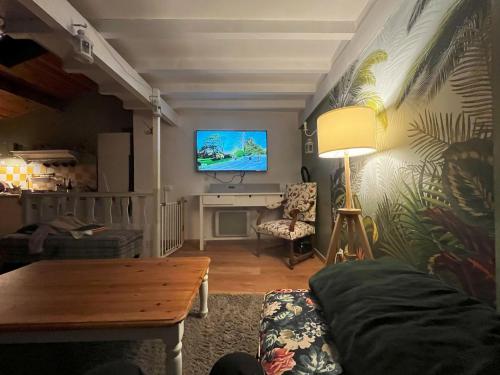 Közös társalgó / TV, Le Cocon des Trois Marmottes in Saillans (Rhone-Alpes)