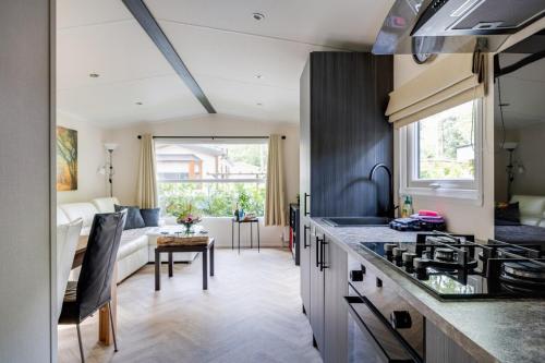 Luxe Chalet Veluwe Sauna en Hottub in Apeldoorn