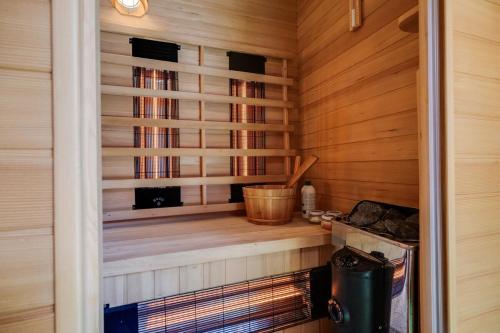 Luxe Chalet Veluwe Sauna en Hottub in Apeldoorn