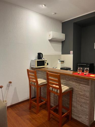 Departamento moderno y con excepcional vista a la montaña (Departamento moderno y con excepcional vista a la montana) in บียานวยบา