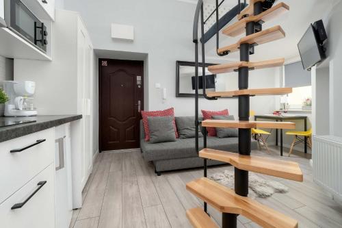 Cozy Studios Mielczarskiego with Mezzanine in Łódź by Noclegi Renters