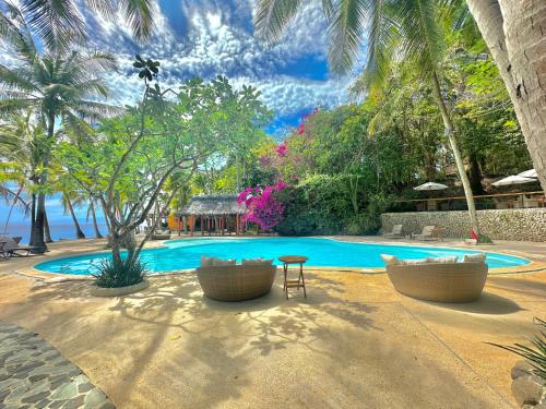 Swimming pool, Coco Sunset Beach Resort in Siquijor Island