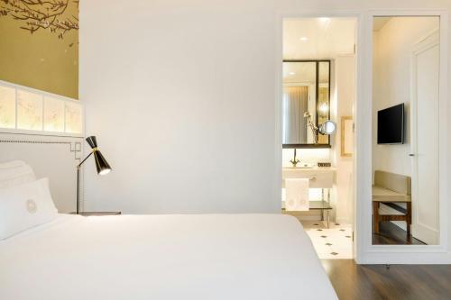 Suite room in Cotton House Hotel Autograph Collection