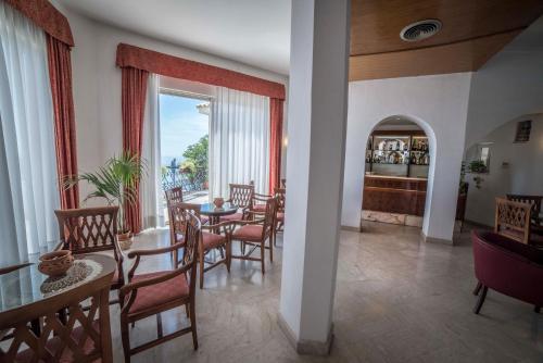 Фойє, Hotel Isola Bella in Таорміна