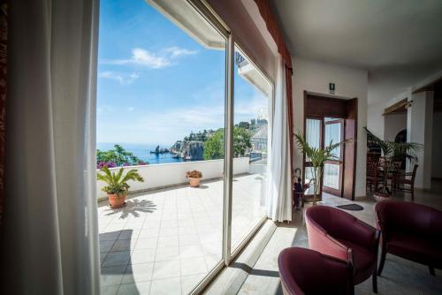 Фойє, Hotel Isola Bella in Таорміна