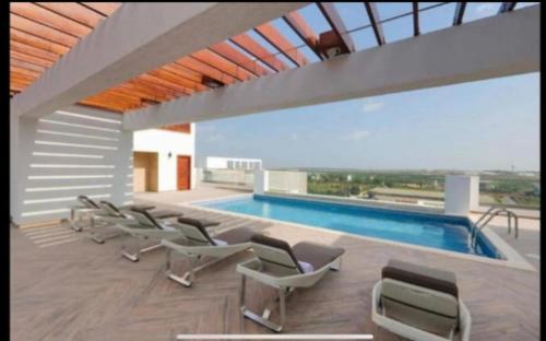 Chic 1BR Apt with Pool, High-speed Internet at The Gallery, 10 mins from Airport, 5mins from Major Restaurants and Malls, Accra (foto 9)