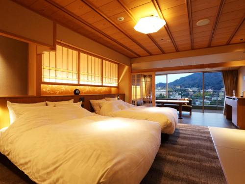 Twin Room with Hot Spring Open Air Bath and Garden View