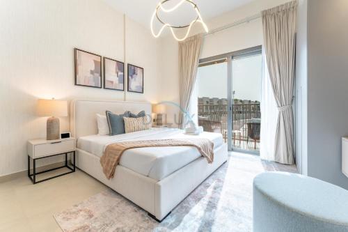 Community Views Studio Near Nad Al Sheba Gardens with Balcony, MAG 980, Mohammad Bin Rashid by Deluxe Holiday Homes, Dubaj