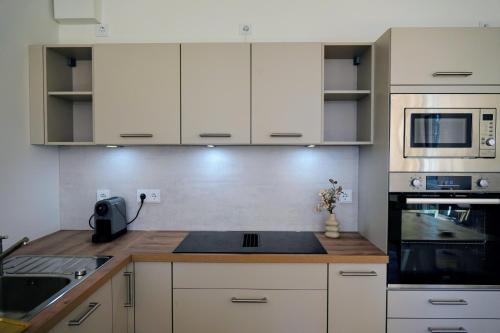 Modernes voll möbliertes Apartment am See mit Garten, nahe BER (Modernes voll mobliertes Apartment am See mit Garten, nahe BER) in 貝斯滕塞