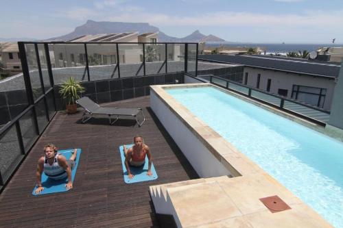 Stylish 9 BR Villa at Sunset Beach - Rooftop Pool - image 14