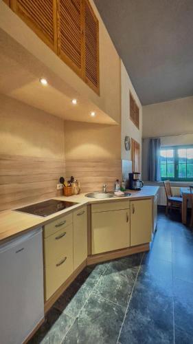 virtuve, Hotel Olbernhau mit Sauna - Kleines Landhotel zur Ofenschenke in Pfaffroda