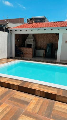 Casal central com piscina, Campo Grande