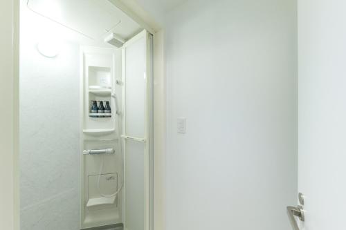 Bunk Bed in Male Dormitory Room with Shared Bathroom image 10